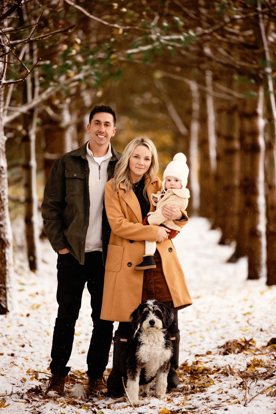 Michael and Halle Kurtz, owners of Arrow Investments Ohio, with their family